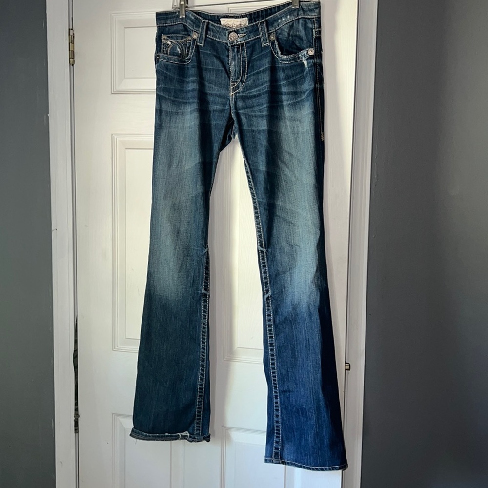 Big distress jeans. Very tall girl friendly.